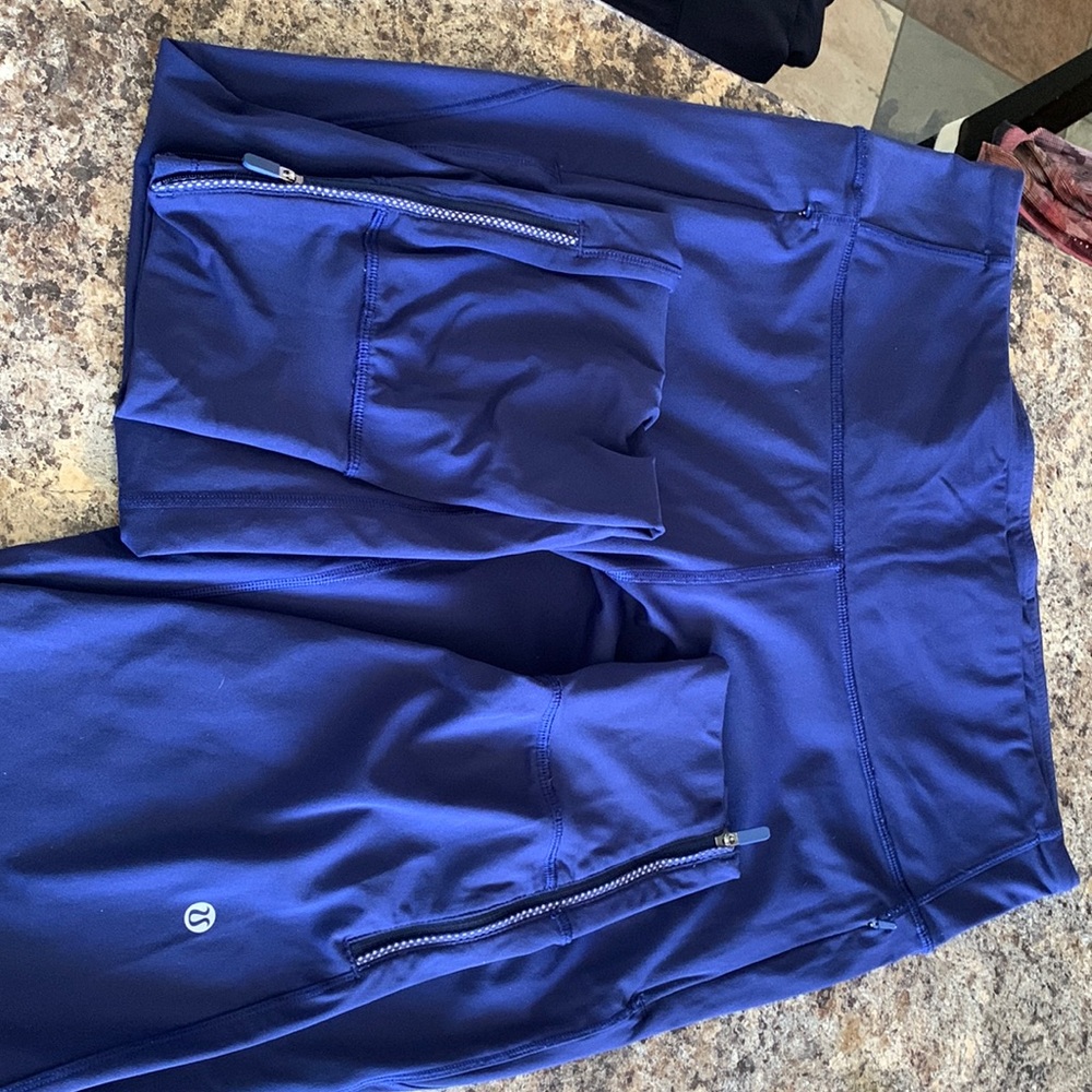LuLu full length tights , zippered cuffs, side pockets . Size 10 good condition